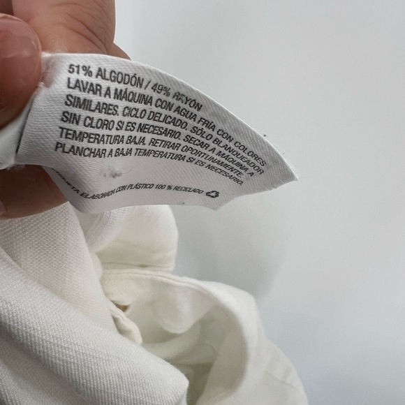 The Nines by HATCH 3/4 Sleeve Button Front Cropped Maternity Jumpsuit In White - Picture 9 of 9